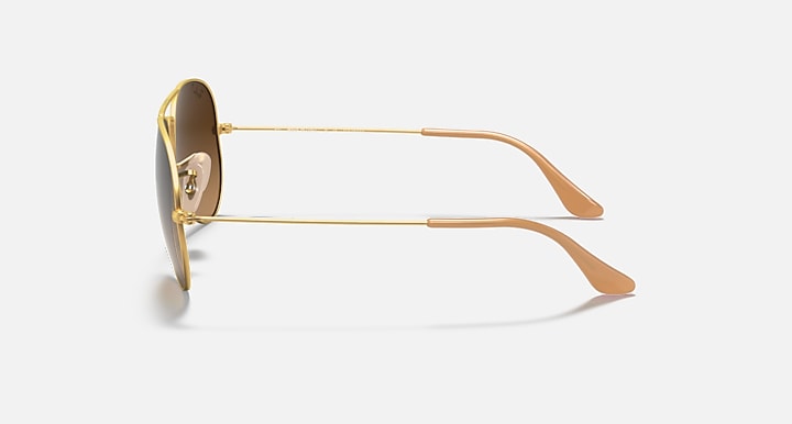 Ray-Ban Aviator RB3025 sunglasses with gold metal frame and brown-tinted lenses