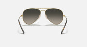 Aviator sunglasses with gold frame and dark grey tinted lenses