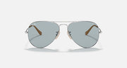 Ray-Ban aviator sunglasses with thin metal frame, light blue lenses, and brown accents.