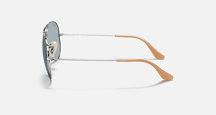 Ray-Ban Aviator RB3025 sunglasses with silver metal frame and brown temple tips