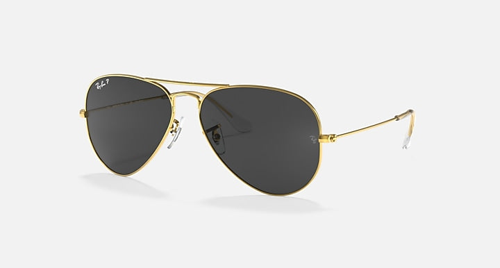 Gold aviator sunglasses with black lenses and slim metal frame arms