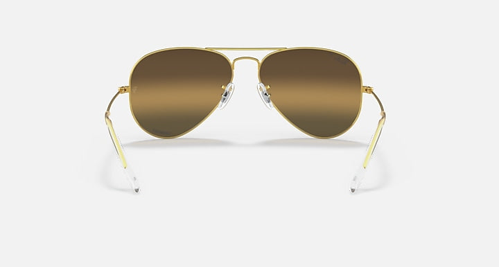 Ray-Ban aviator sunglasses with brown lenses, gold metal frame and curved bridge