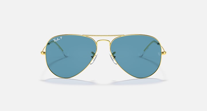 Ray-Ban aviator sunglasses with gold frame and blue tinted lenses