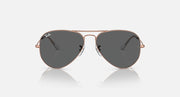 Ray-Ban aviator sunglasses with rose-gold frame and dark gradient lenses