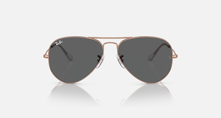 Ray-Ban aviator sunglasses with dark gray lenses and rose-gold metal frame