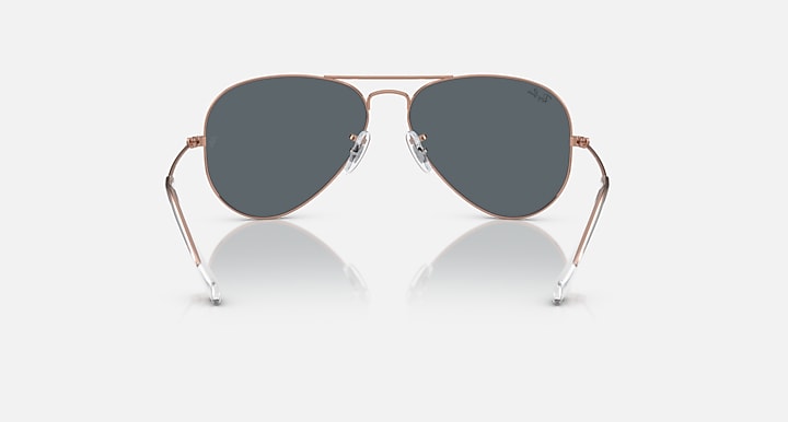 Ray-Ban aviator sunglasses with rose gold metal frame and gray tinted lenses