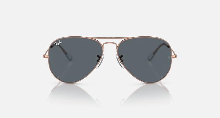 Ray-Ban aviator sunglasses with blue-gray lenses and rose-gold metal frame