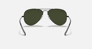 Ray-Ban aviator sunglasses with dark green lenses and dark metal frame temples