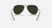 Ray-Ban aviator sunglasses with dark green lenses and dark metal frame temples
