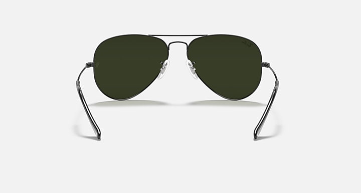 Ray-Ban aviator sunglasses with dark green lenses and dark metal frame temples