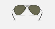 Ray-Ban aviator sunglasses with dark green lenses and arched metal nose bridge