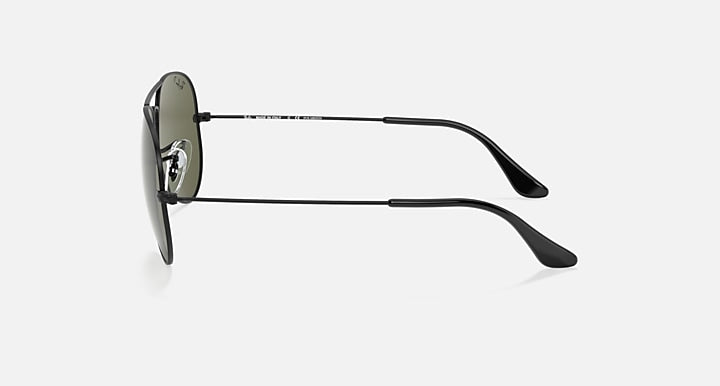 Ray-Ban aviator sunglasses side view with dark green lens and metal temple