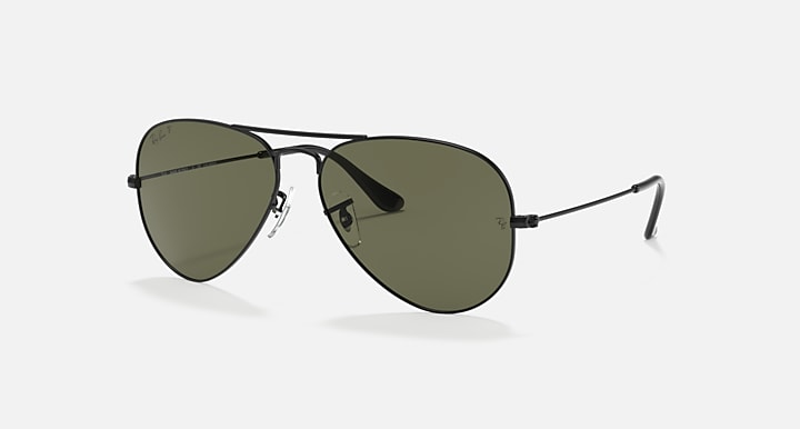 Ray-Ban aviator sunglasses with dark green lenses and thin metal frame