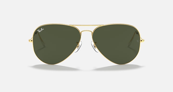 Front view aviator sunglasses with gold frame and dark green lenses