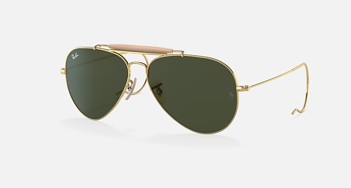 Gold frame aviator sunglasses with dark green lenses, side view