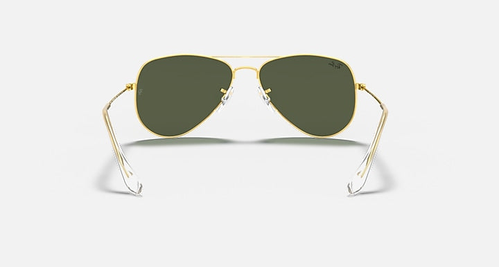 Gold small aviator sunglasses with dark green lenses and metal ear tips
