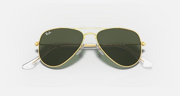 Gold small aviator sunglasses with dark green lenses and clear bridge