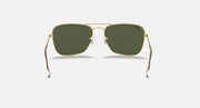 Ray-Ban Caravan sunglasses front view with dark green lenses and slim gold arms