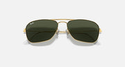 Ray-Ban Caravan sunglasses close front with dark green lenses and gold bridge