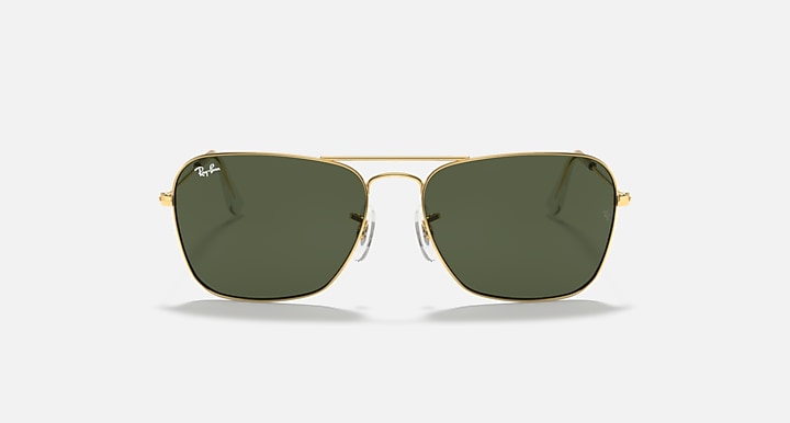 Ray-Ban Caravan sunglasses with dark green lenses on gold-tone frame, front view