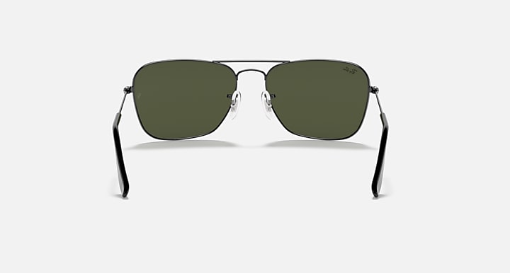 Ray-Ban aviator sunglasses front view with gunmetal frame and dark green lenses