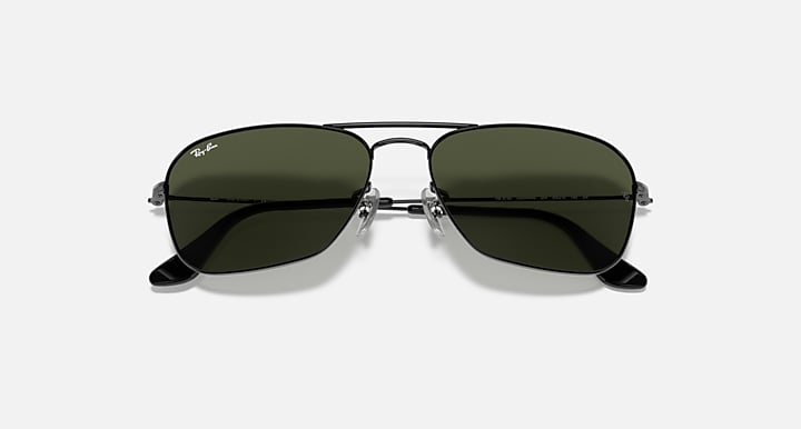 Ray-Ban aviator sunglasses with dark green lenses and gunmetal frame bridge detail