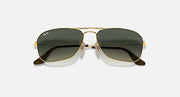 Ray-Ban Caravan RB3136 sunglasses, centered front with gold frame and dark green lenses