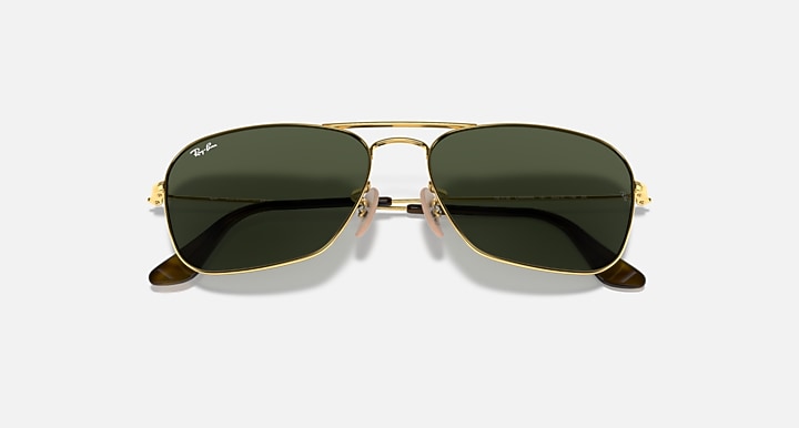 Gold sunglasses with dark green lenses and double front hinge