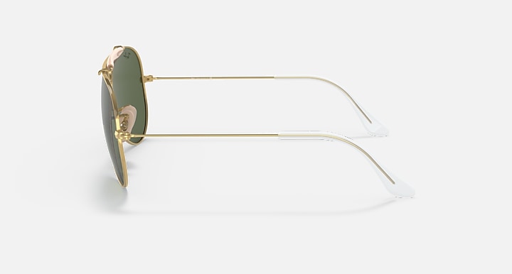 Ray-Ban aviator sunglasses side view, gold frame with dark green lens and metal temple