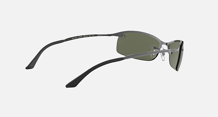 Ray-Ban RB31830 sunglasses angled view, green lens, gunmetal temple with logo