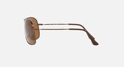 Ray-Ban aviator sunglasses side view, brown lenses, gold-tone metal temples