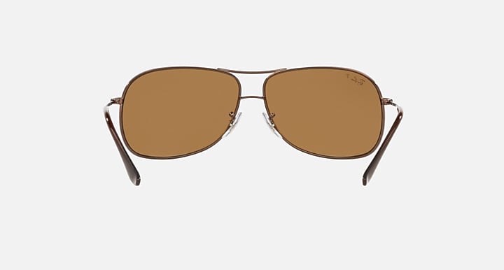 Ray-Ban aviator sunglasses front view, brown lenses, metal frame with nose bridge