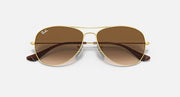 Ray-Ban cockpit sunglasses close front, gold frame and brown gradient lenses