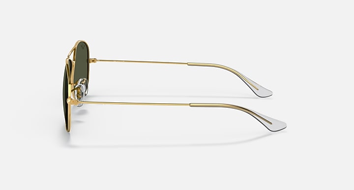 Gold metal aviator sunglasses, side profile with dark green lens and slim arms