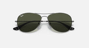 Ray-Ban aviator sunglasses, dark green lenses with black temple tips, silver metal frame
