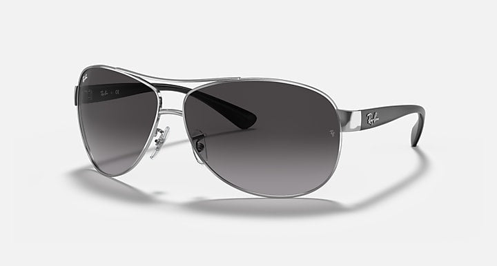 Aviator sunglasses with silver frame and dark gray gradient lenses