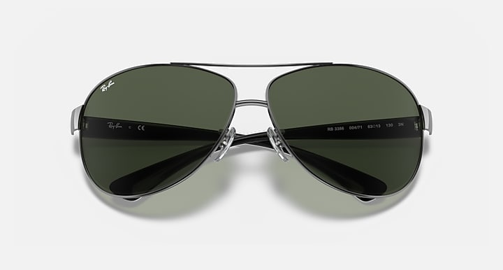 Ray-Ban aviator sunglasses, gunmetal frame with dark green tinted lenses