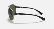 Ray-Ban aviator sunglasses, side profile with green tinted lenses and black temples