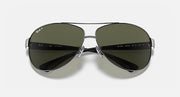 Ray-Ban aviator sunglasses with green lenses and silver metal frame, top view.