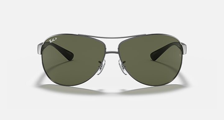 Ray-Ban aviator sunglasses with green lenses and silver metal frame, front view.