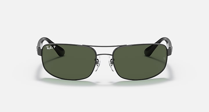 Rectangular full-frame sunglasses with black frame and dark green lenses