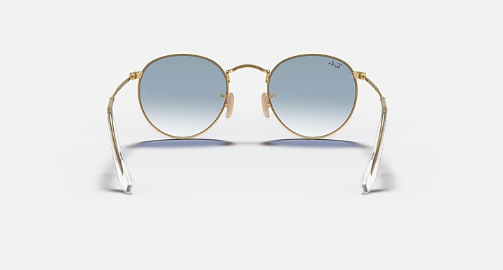 Gold-tone round sunglasses with light blue lenses, front view