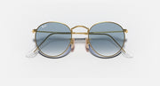 Gold-tone round sunglasses with green-tinted lenses, front view