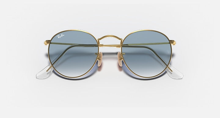 Gold-tone round sunglasses with green-tinted lenses, front view