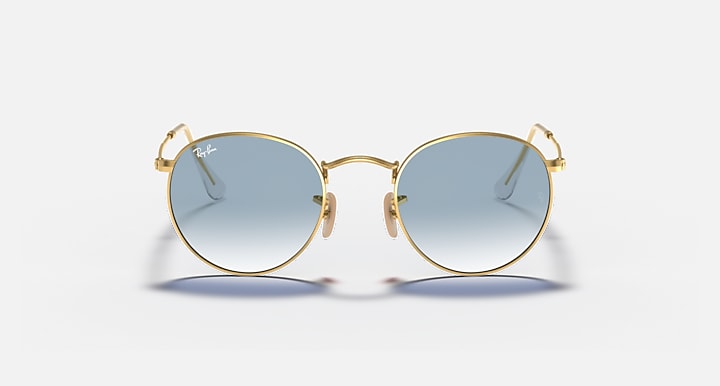 Gold-tone round sunglasses with light blue lenses, front view