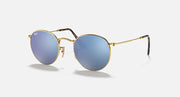 Round Ray-Ban sunglasses with gold frame, light-blue mirrored lenses, tortoise temple tips