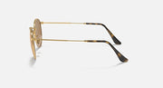 Ray-Ban RB3447N round sunglasses, gold metal frame with dark tortoise temple tips