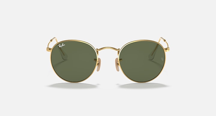 Ray-Ban RB3447N round sunglasses with gold frames and green tinted lenses