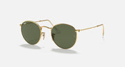 Ray-Ban RB3447N round sunglasses with gold frames and dark green tinted lenses