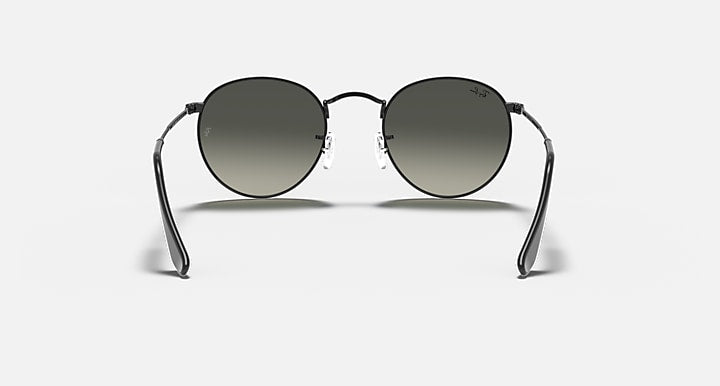 Black round sunglasses with dark lenses, front view